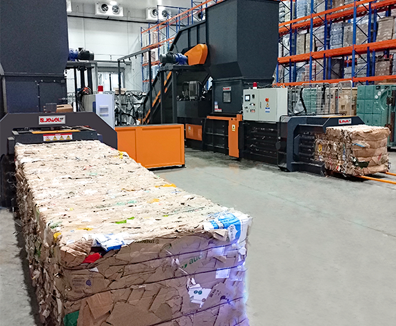 Soluzione automatizzata per lo smaltimento dei rifiuti di imballaggio presso il principale centro logistico di supermercati della Russia